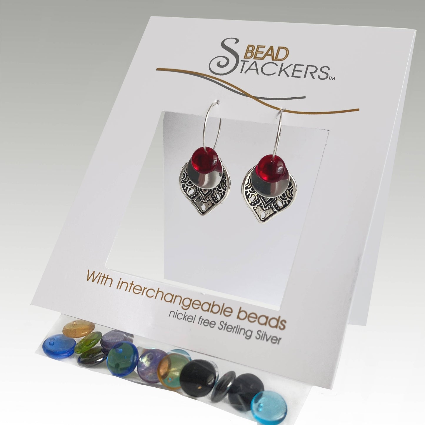 TC40 - Earrings come with 9 interchangeable colours.