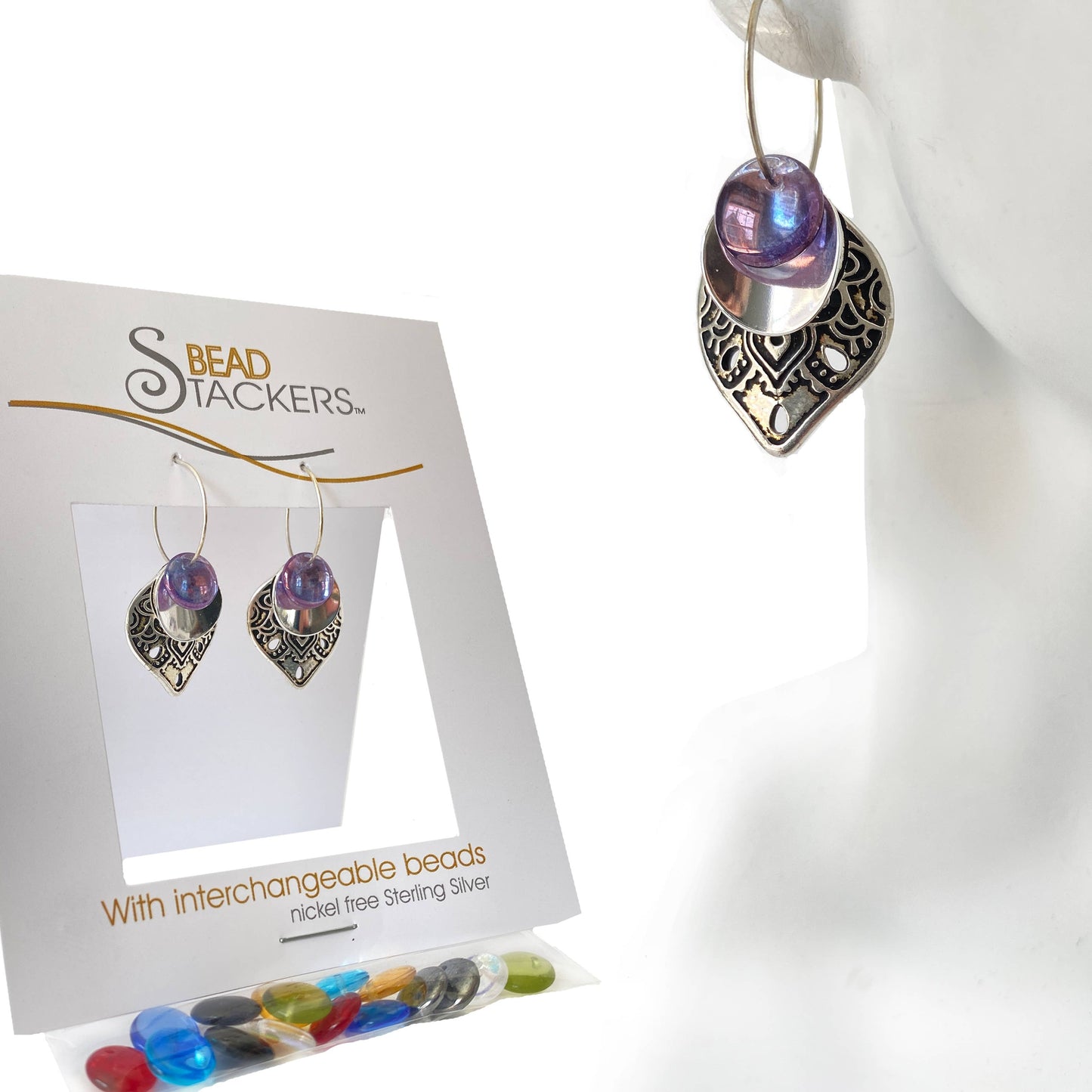TC40 - Earrings come with 9 interchangeable colours.